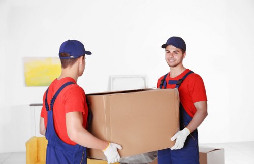 Professional packing services in Brent with moving boxes and protective materials