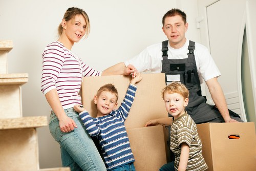 Office relocation planning in Brent with moving boxes and desks