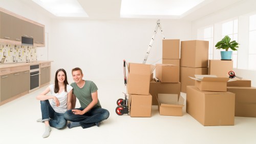 Packed boxes and protected items ready for a flat move in Brent